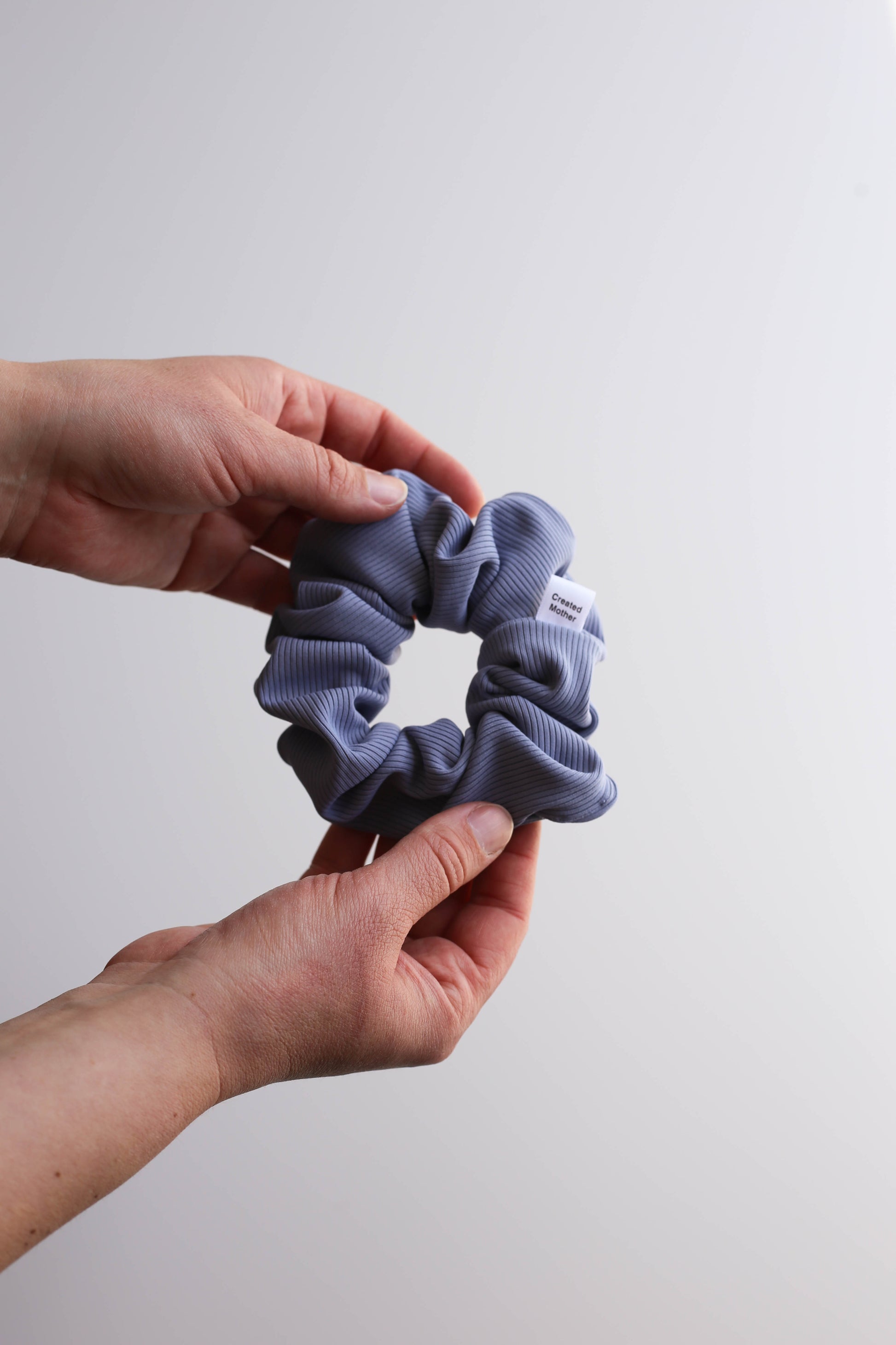 Periwinkle blue ribbed swim scrunchie made from quick-dry fabric