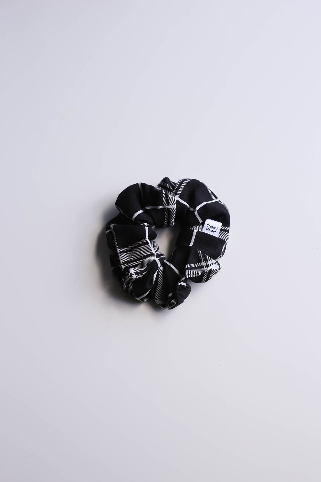 Black and white plaid scrunchie with strong hold by created mother 