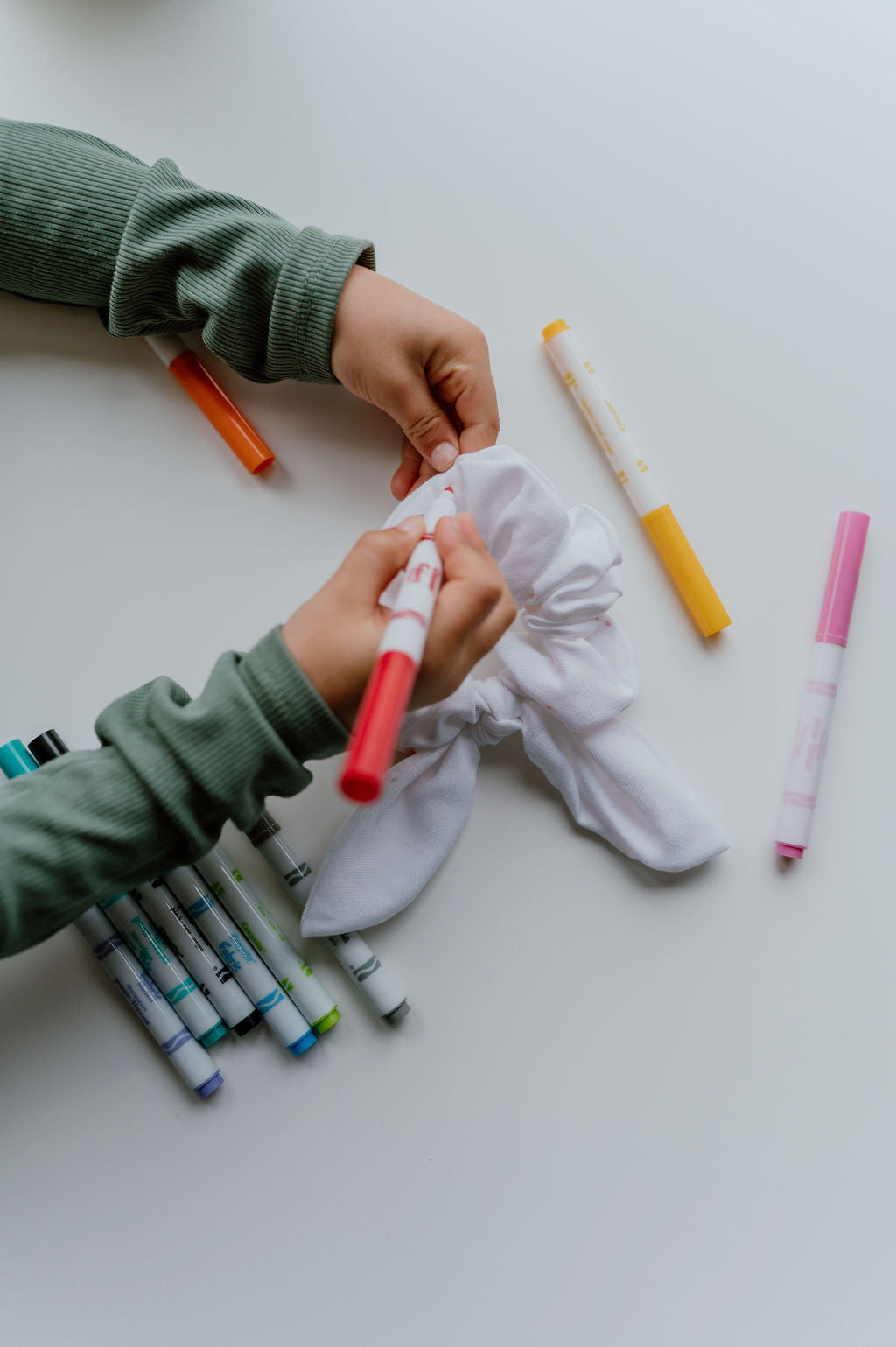 Colour scrunchies with fabric markers by created mother