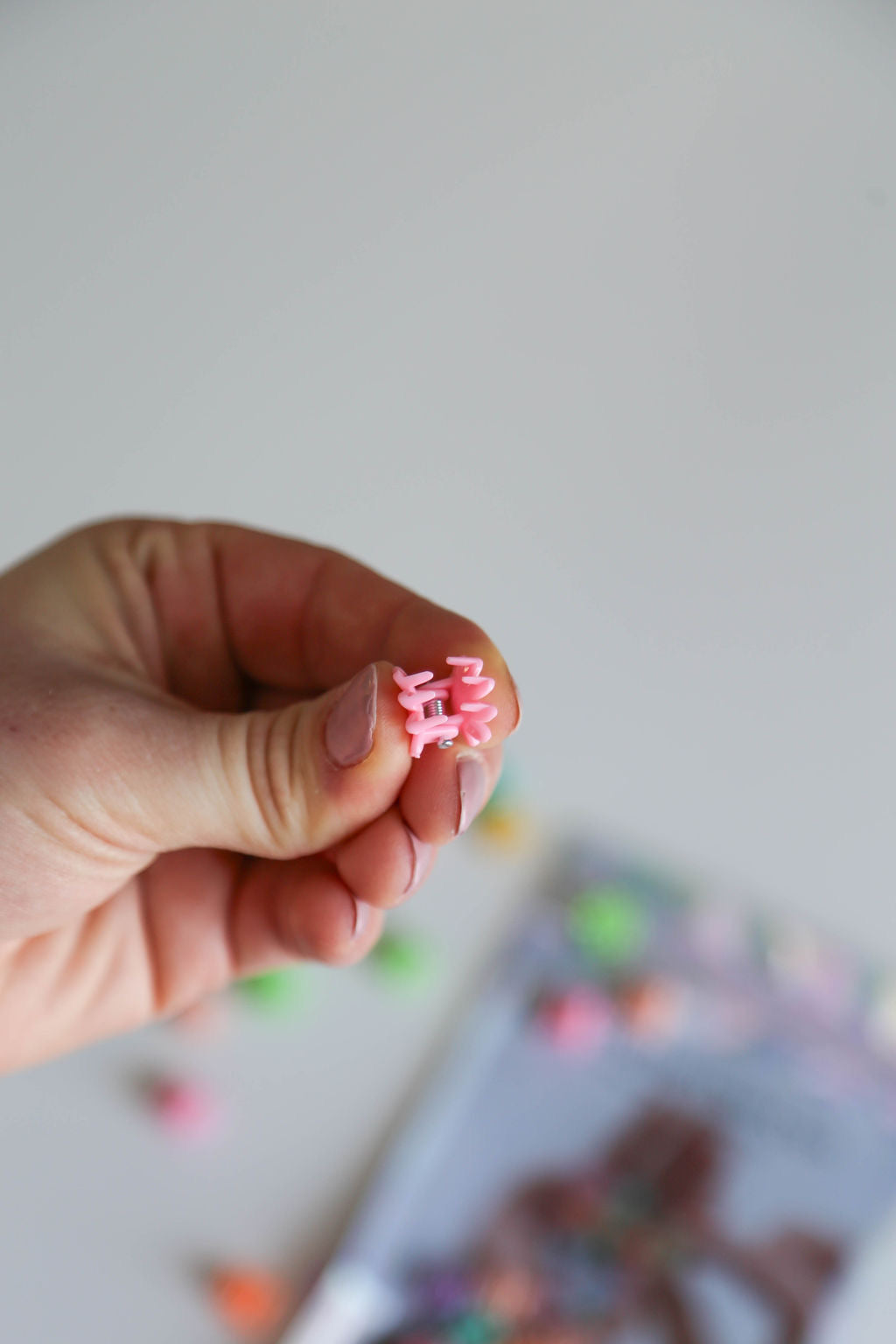 Bright and colorful micro hair claw clips, perfect for toddlers and little girls to create adorable hairstyles.