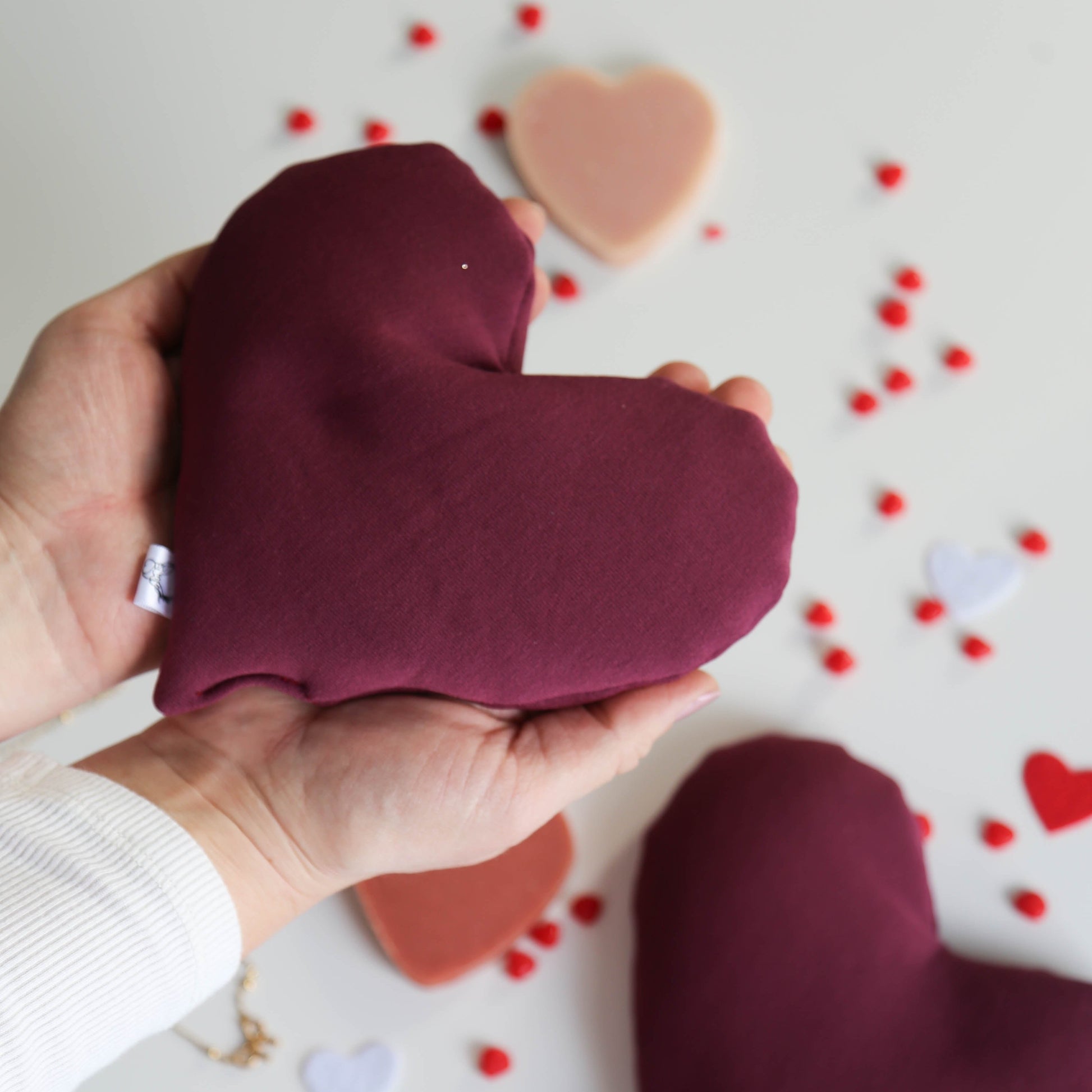 A heart-shaped hot/cold therapy pack for soothing warmth or cooling relief, perfect for Valentine’s Day.