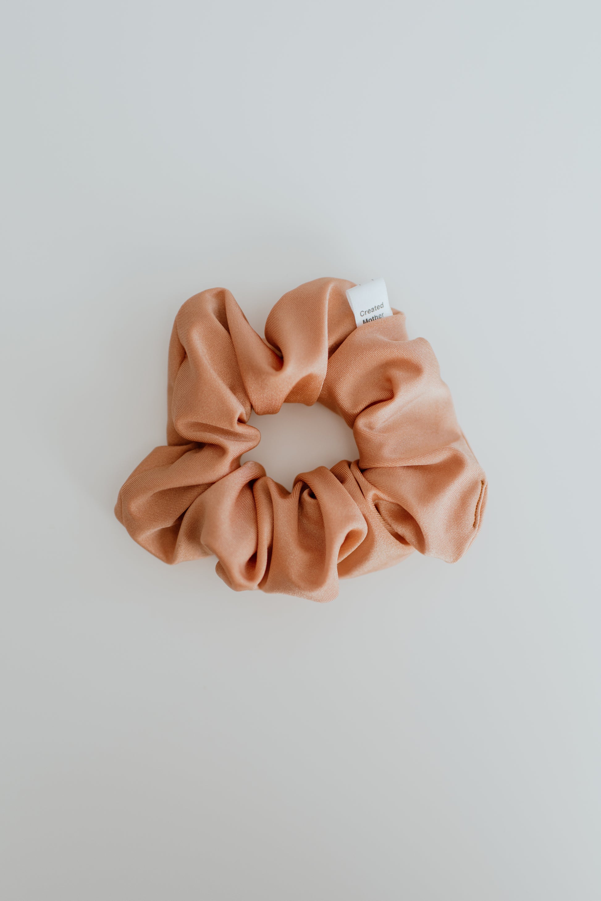 Quick-dry peach scrunchie perfect for pool and beach