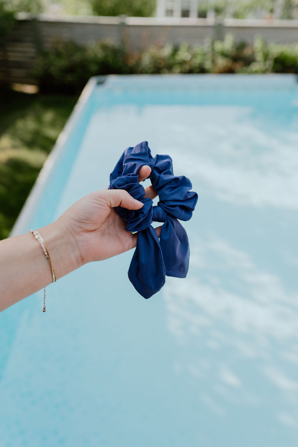 Lightweight indigo scrunchie made from spandex and nylon