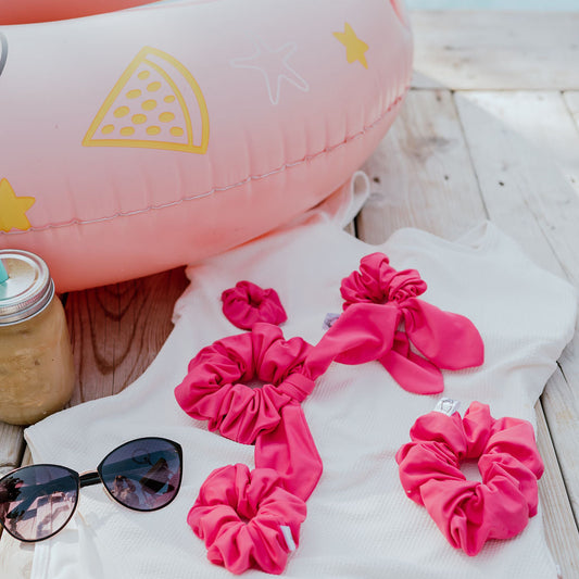 Pink swim scrunchie made from quick-dry swimsuit fabric