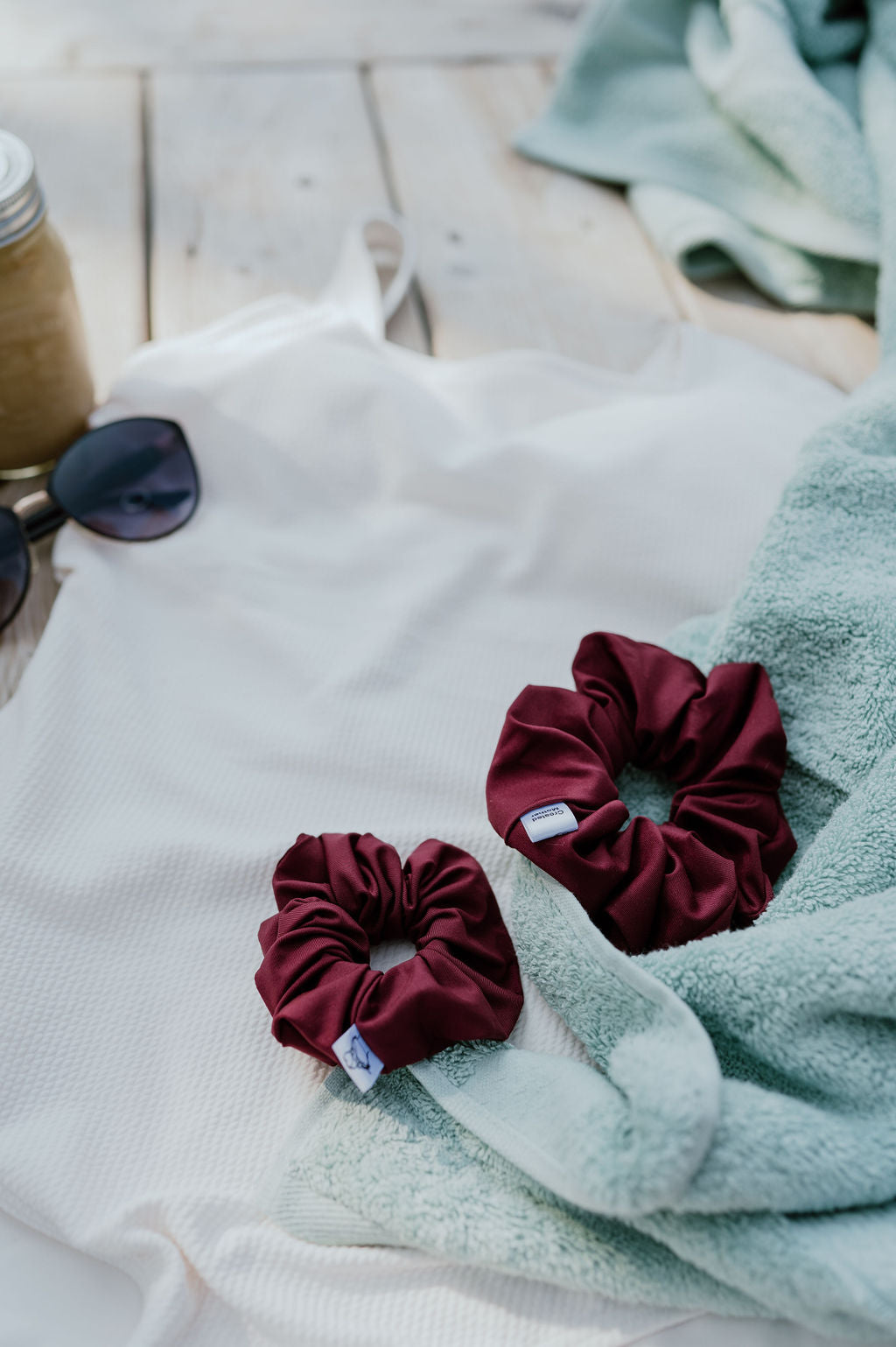 Sophisticated wine swim scrunchie holding hair securely