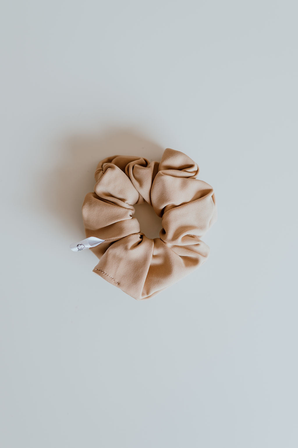 Durable tan swim scrunchie for active lifestyles